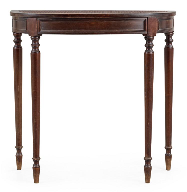A stained birch console table, with rattan top, NK, Sweden 1920's.