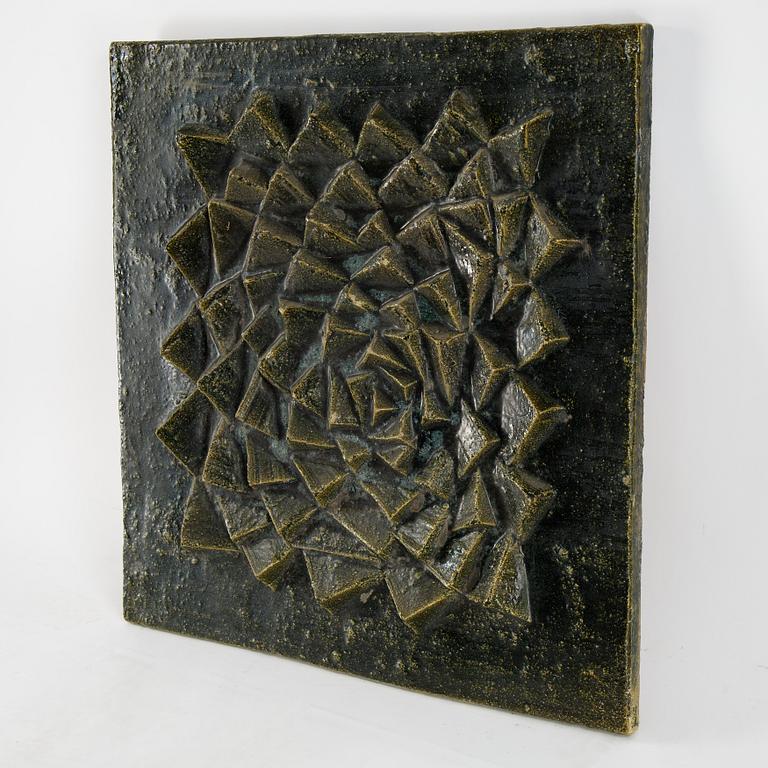 A stoneware wall relief by Stig Lindberg, not signed.