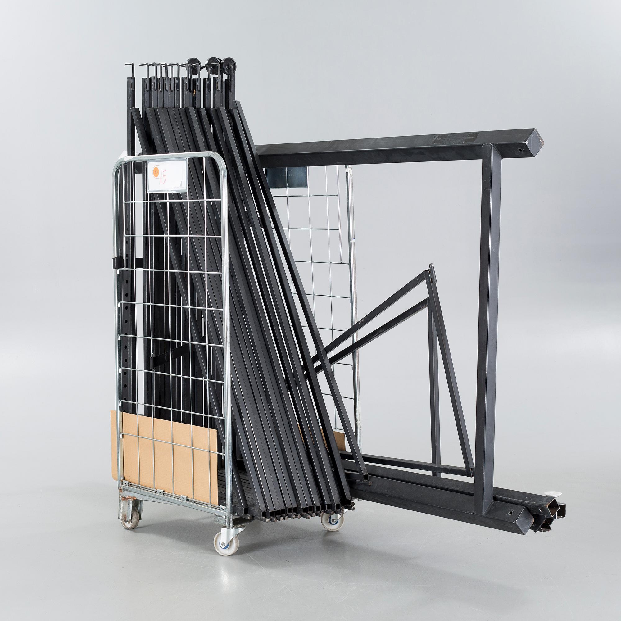 A 21st century showroom rug hanger.