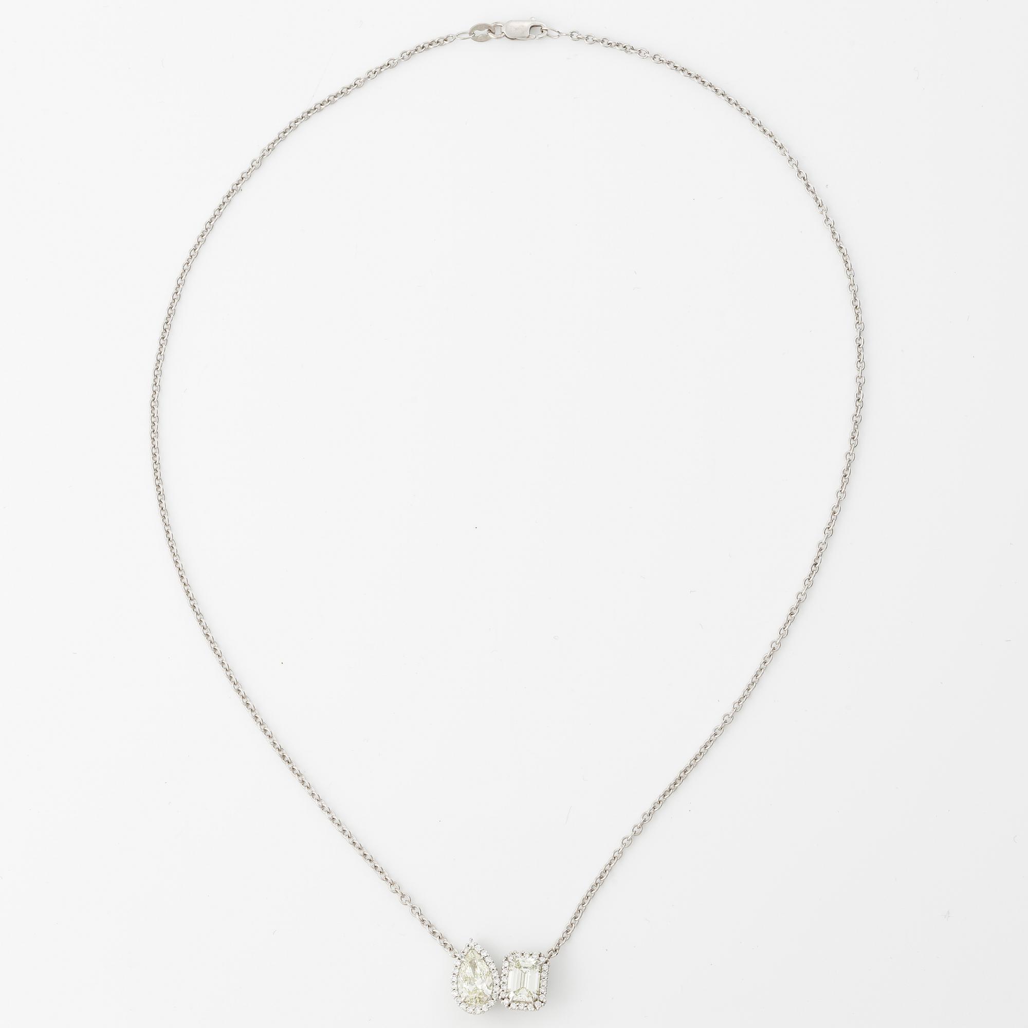 Necklace 18K white gold with pear-shaped and emerald-cut diamond accompanied by IGI and GIA report.