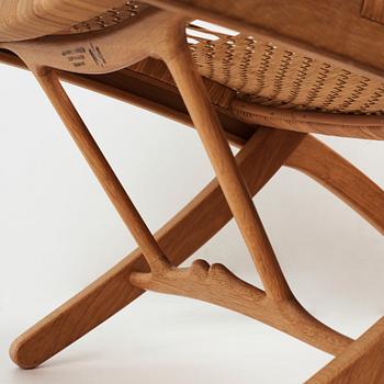 Hans J. Wegner, a pair oak and rattan "model 512" folding chairs by Johannes Hansen, Denmark 1950-60's.