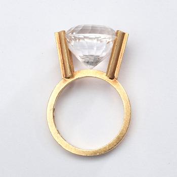 Wiwen Nilsson, a 18k gold ring with a facet cut rock crystal, Lund 1972.