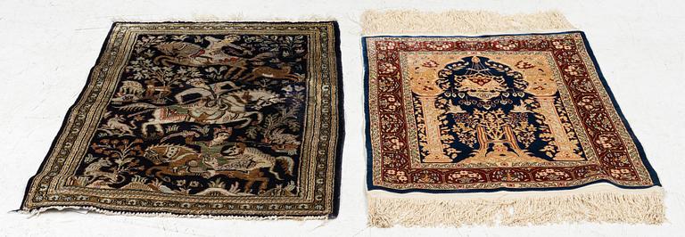 Carpets, two smaller Hereke and Ghom, silk.