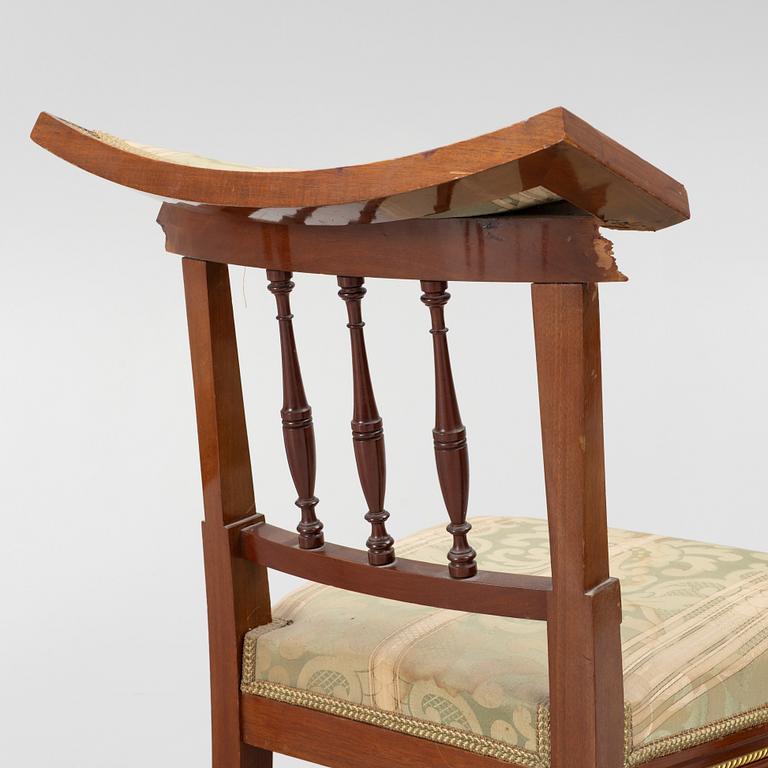 A sofa, two armchairs, four chairs and table, Empire style, 20th century.