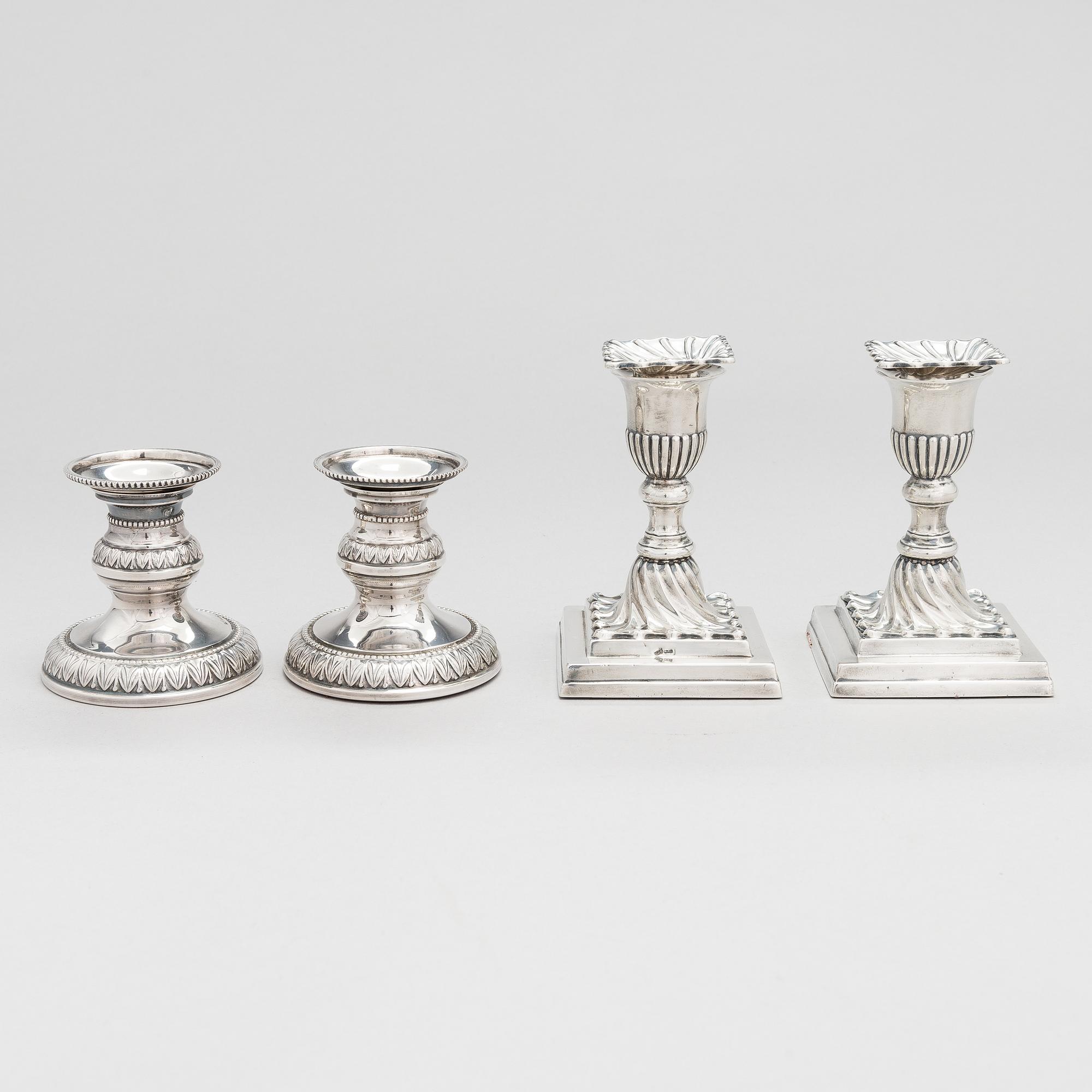 Two pairs of silver candlesticks, England 1889 and Finland 1975.