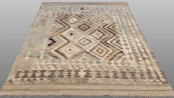 A Kilim carpet, ca 275 x 187 cm.