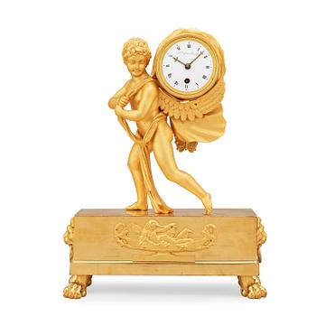 A Swedish Empire early 19th century gilt wood mantel clock by J E Callerström, master 1817.