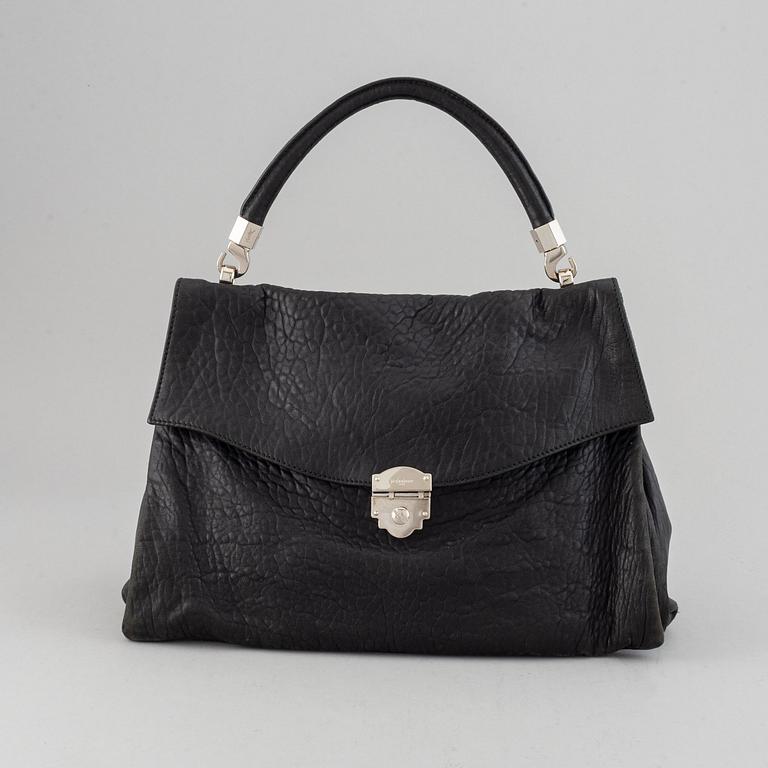 Yves Saint Laurent, a black leather bag.