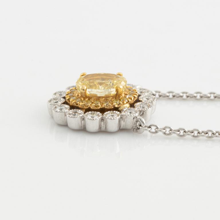 Oval cut yellow diamond and brilliant cut diamond necklace.