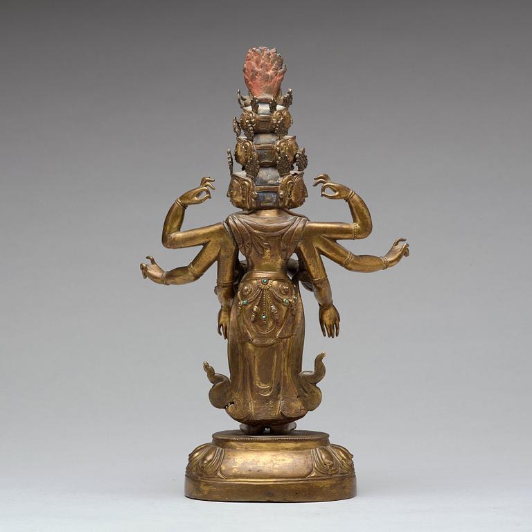 A Tibeto-Chinese gilt bronze figure of eleven-headed Avalokiteshvara, 19th Century.