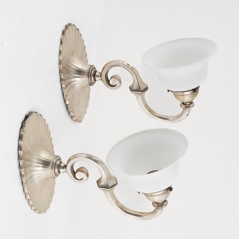 A pair of silver-plate wall lamps, C.G. Hallberg, 1920's.