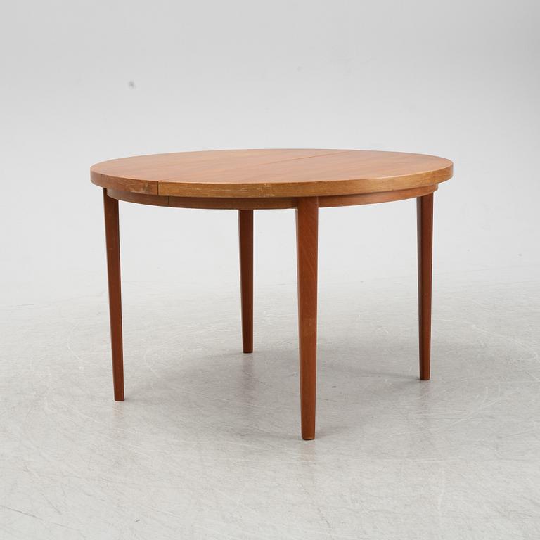 A five-piece teak and oak dining suite, second half of the 20th Century.