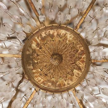 A late Gustavian gilt brass and cut glass seven-light chandelier, Stockholm, late 18th century.