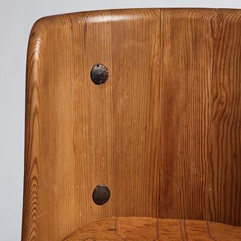 Axel Einar Hjorth, a pair of stained pine 'Lovö' chairs, Nordiska Kompaniet, Sweden 1930s.