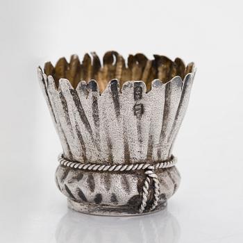 A silver and glass bottle with eight silver charka, maker marks of Pyotr Yermolajevich Davidov, Saint Petersburg, 1884.