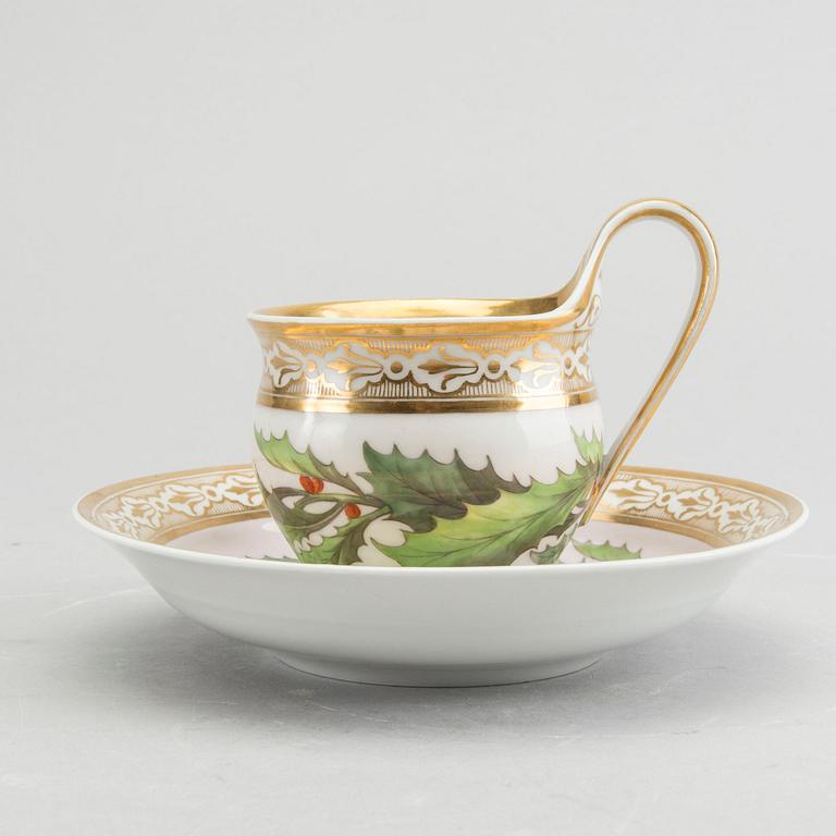 A KPM porcelain cup and saucer ca 1813-15.