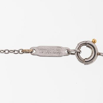 Tiffany & Co, kaulakoru, risti, platinaa ja timantteja, yht. noin 0.66 ct.