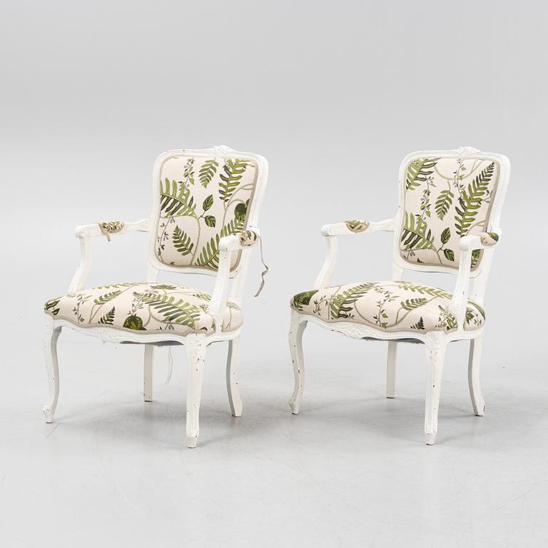 A pair of Rococo style armchairs, 20th century.