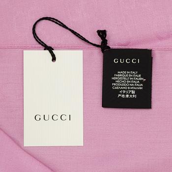 Gucci, a wool and silk mix "GG" jaquard shawl.