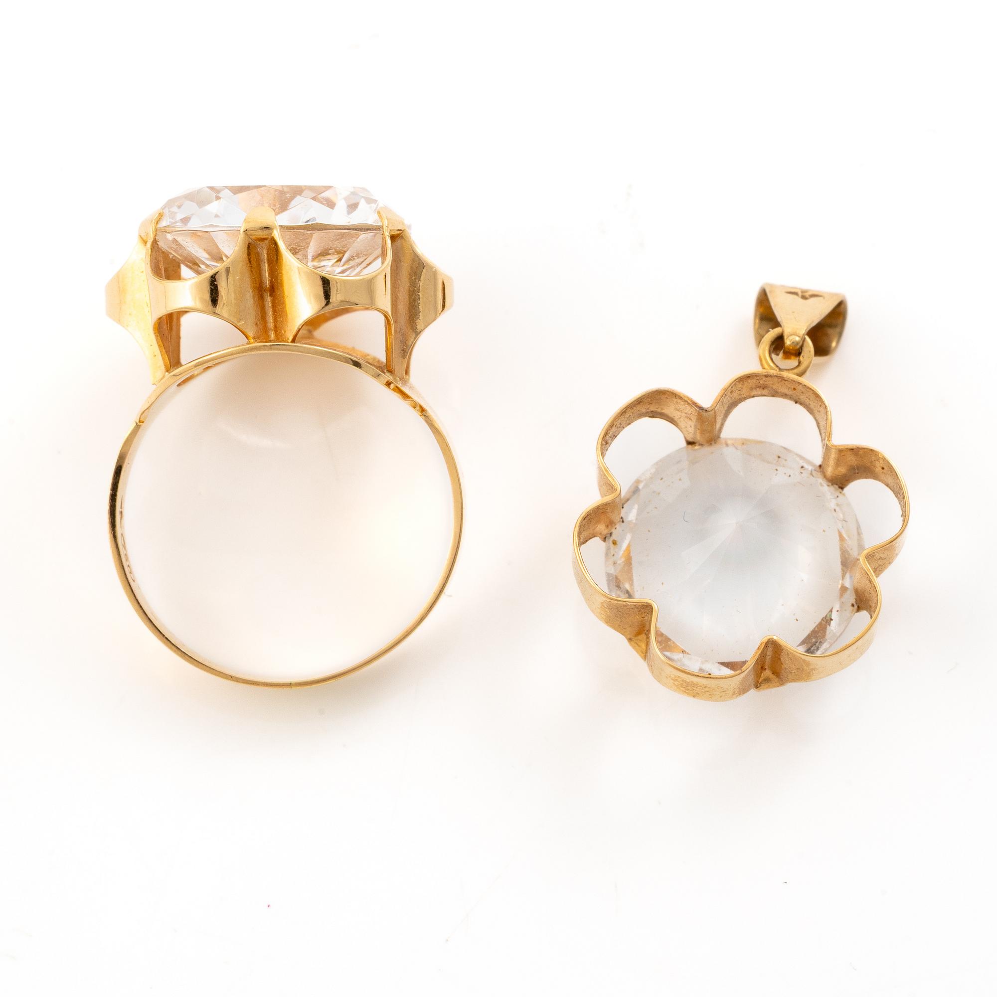 Ring and pendant, 18K gold with synthetic white stones.