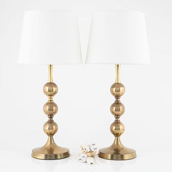 A pair of table lamps, yellow metal, second half of the 20th century.
