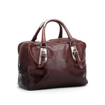 PRADA, a brown leather glace zipper bag.