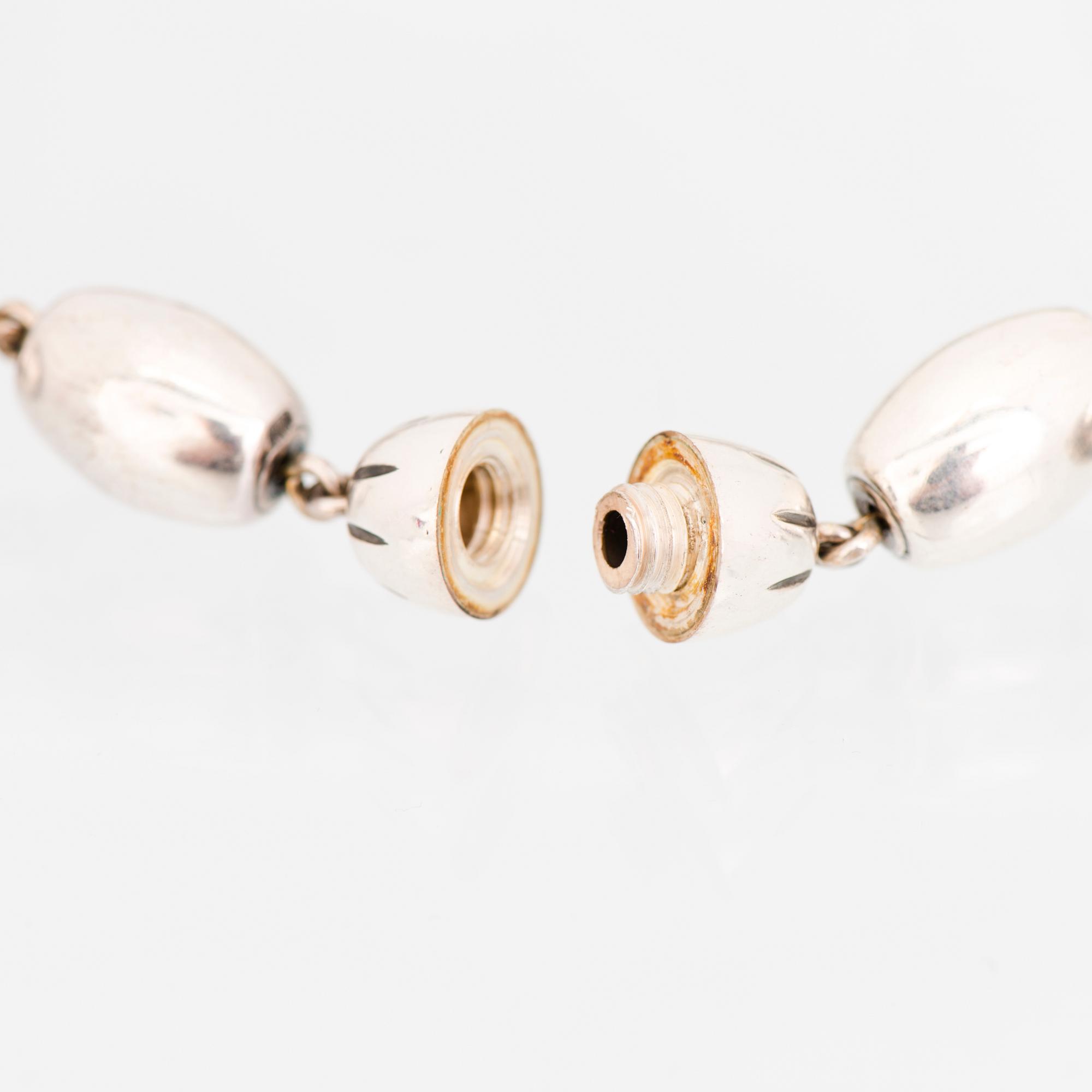 KAULAKORU, RANNEKORUJA, 2 kpl, ja SORMUS, "Halikon Kääty", hopeaa. Kalevala Koru 1972-83.