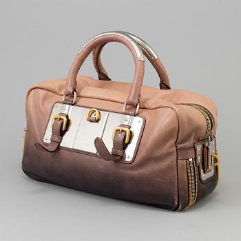 A bag by Prada.