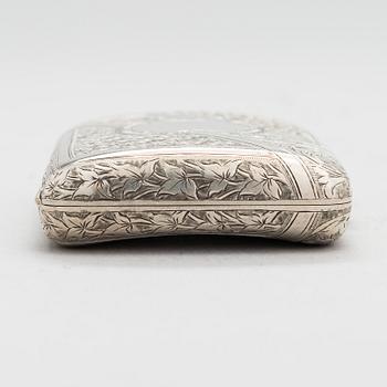 An English sterling silver cigarette case, maker's mark William M. Hayes, of Birmingham, 1896.