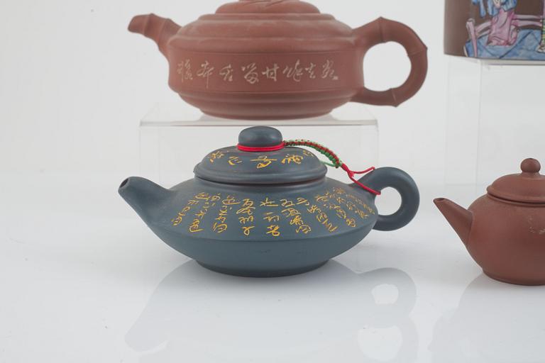 A collection of Yixing tea pots and tea cups, China, second half of the 20th century.