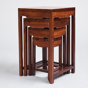 A huanghuali four piece corner leg nesting table, Qing dynasty.