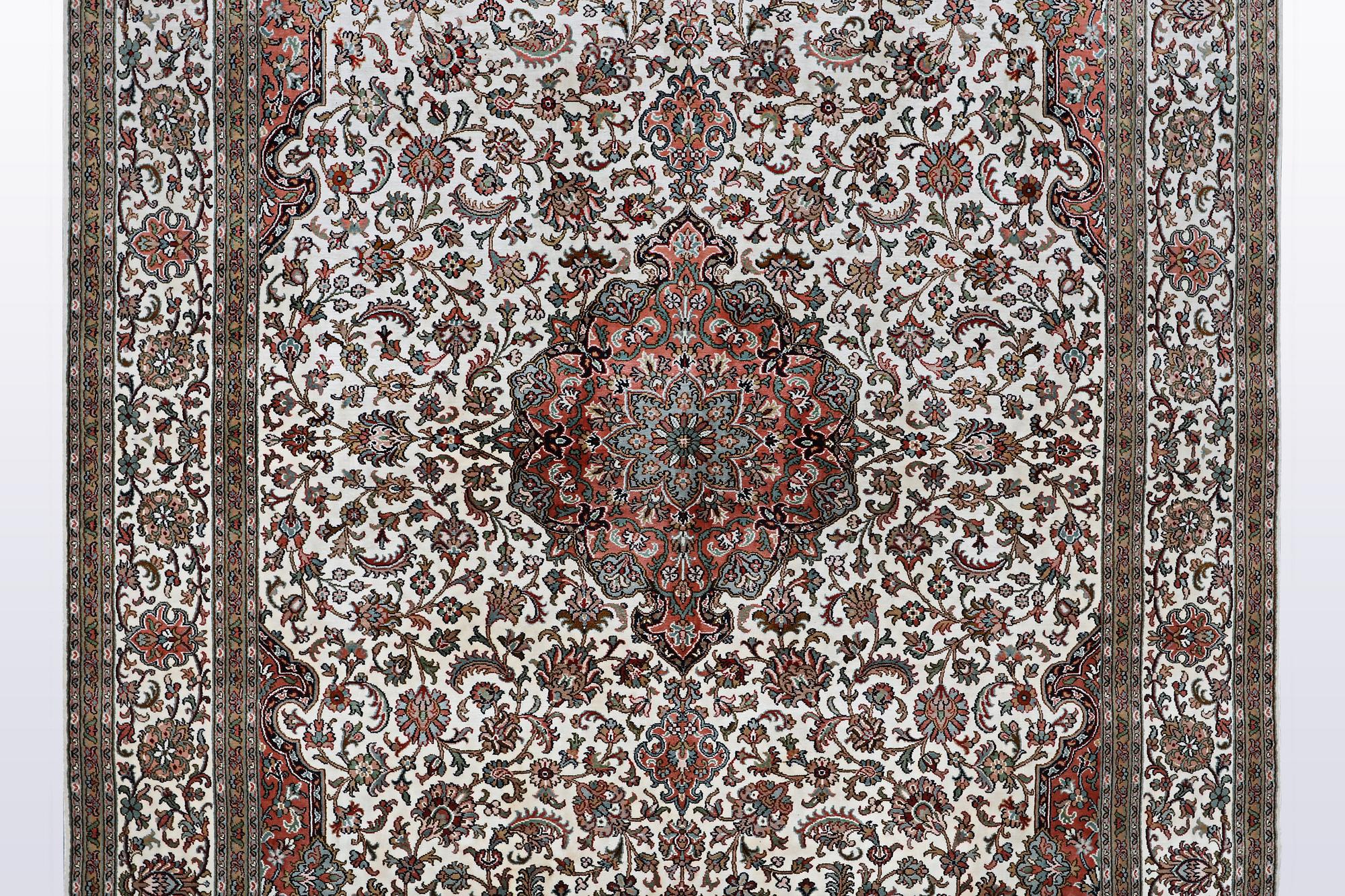 A carpet, silk Kashmir, ca 260 x 172 cm.