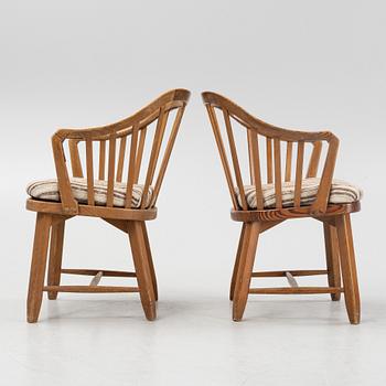 A pair of 'Hytte' pinewood armchairs, Nordiska Kompaniet, Sweden, 1940's.