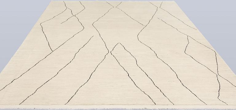 A Moroccan carpet, 335 x 258 cm.