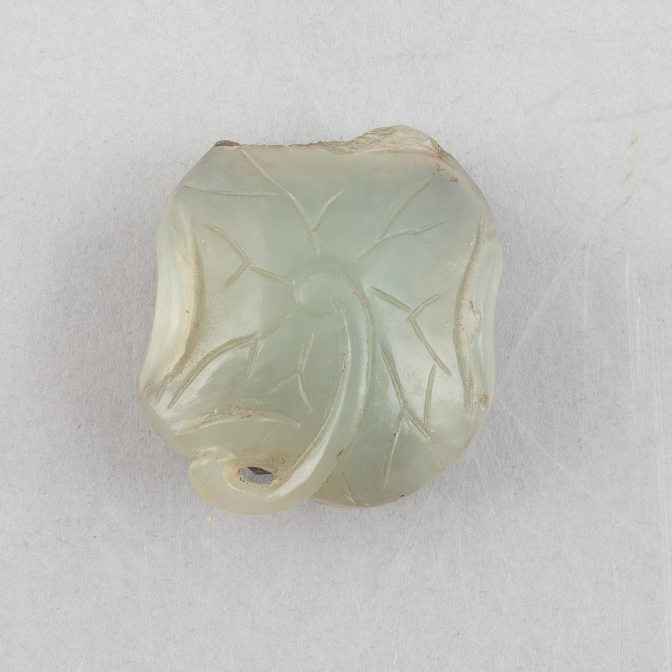 A group of three Chinese stone charms, 20th century.