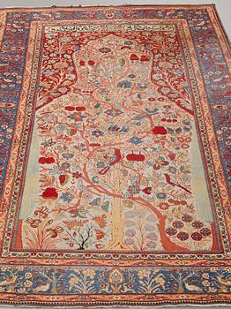 A RUG, a semi-antique Kashan Motachem figural, ca 211 x 134 cm.