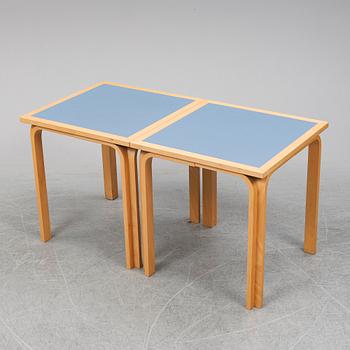 Table with four chairs, late 20th Century by Magnus Olesen.