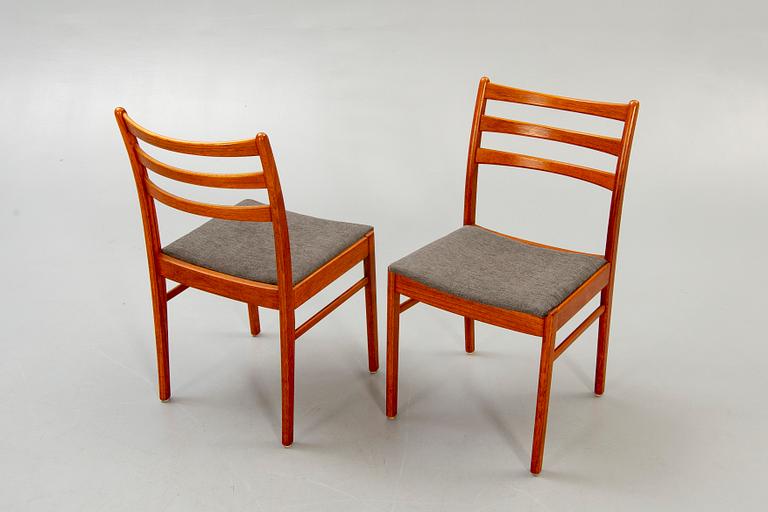 A set of six t1960s teak dining chairs.