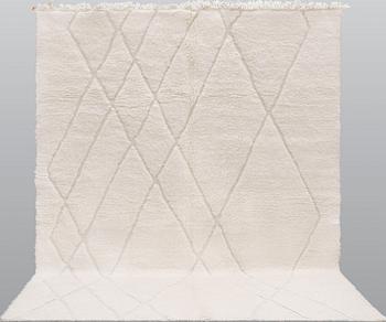 A Moroccan carpet, c 340 x 276 cm.