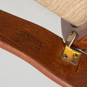 YNGVE EKSTRÖM, a "Kurva" armchair by Swedese.