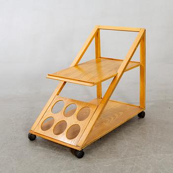 An Italian oak trolley later part of the 20th century.