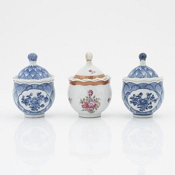 A set of two blue and white custard cups and a famille rose custard cup, Qing dynasty, Qianlong (1736-95).