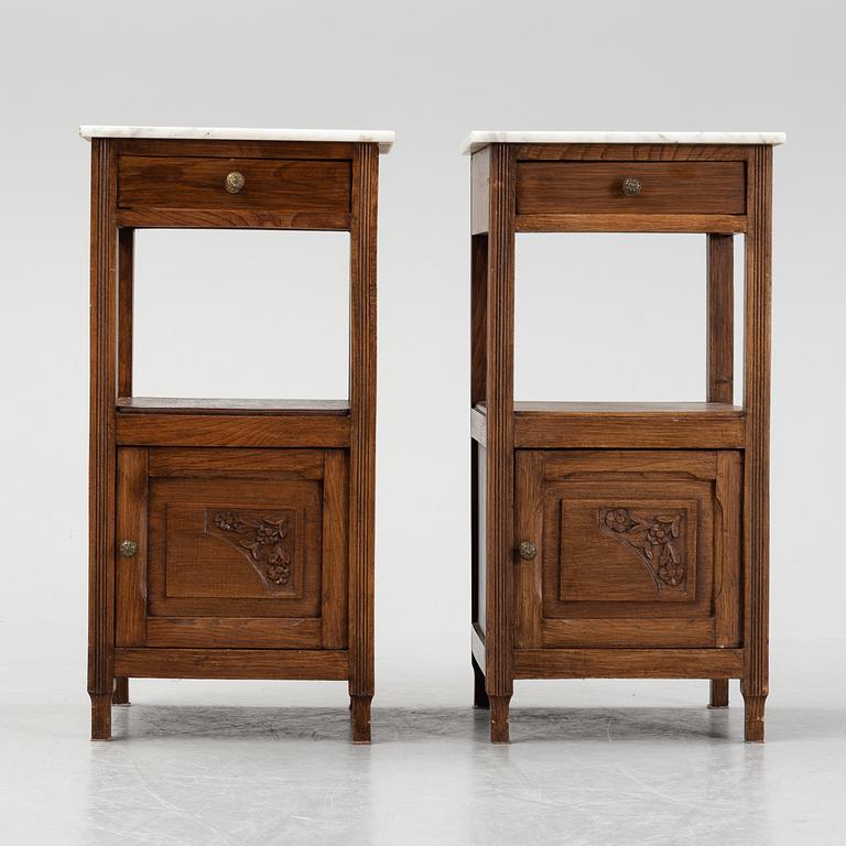 A pair of early 20th Century bedside tables.