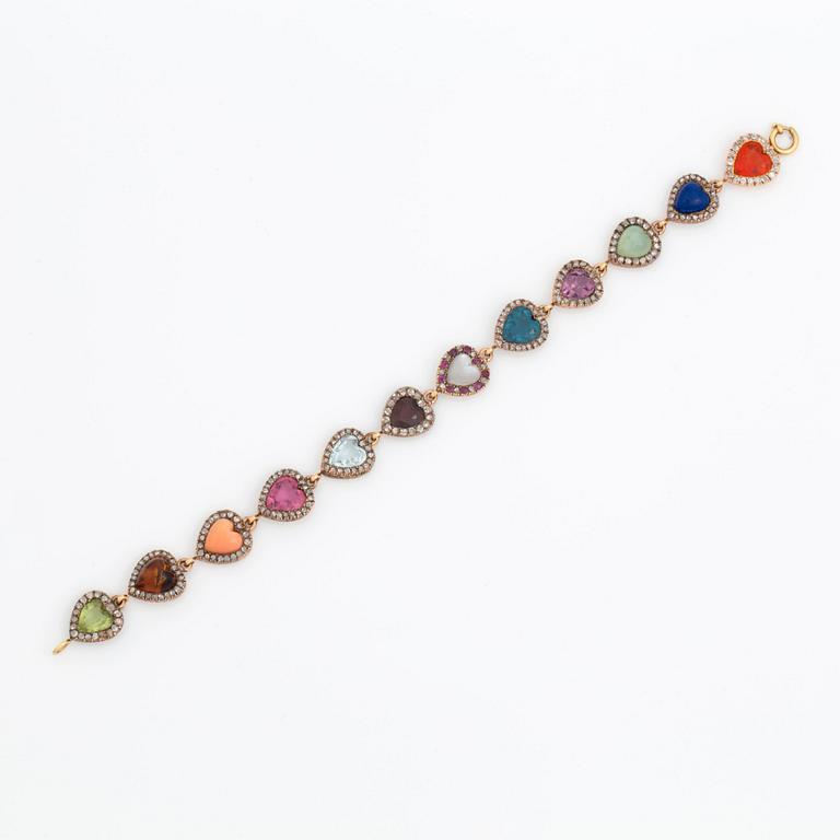 A BRACELET set with coloured stones and rose-cut and old-cut diamonds.