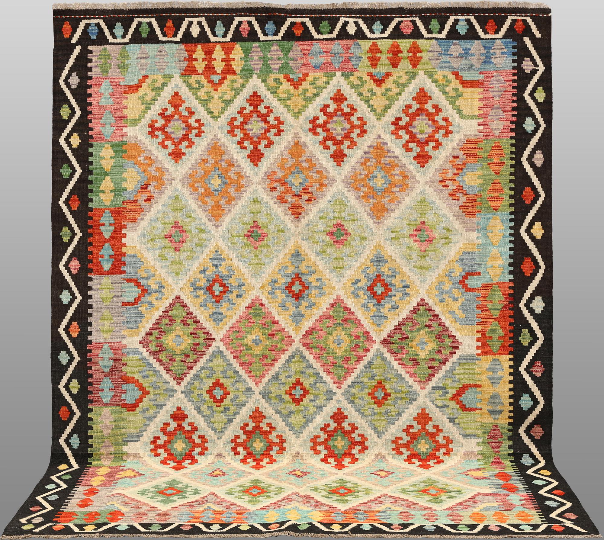 A kilim carpet, 241 x 182 cm.