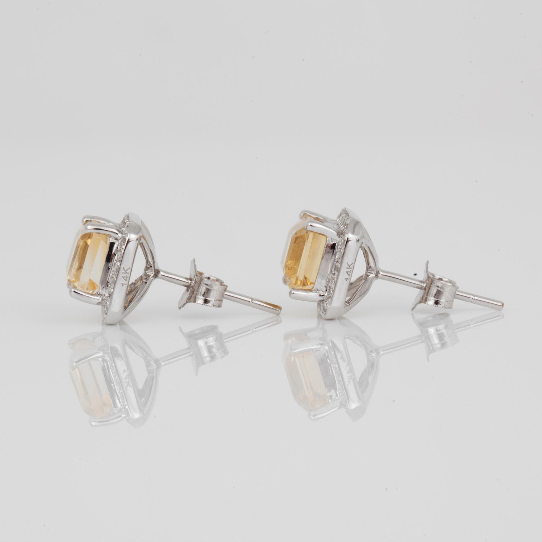 ÖRHÄNGEN, ett par, 14K vitguld med smaragdslipade citriner, tot ca 2,75 ct med små diamanter. Total vikt ca 3,36 g.