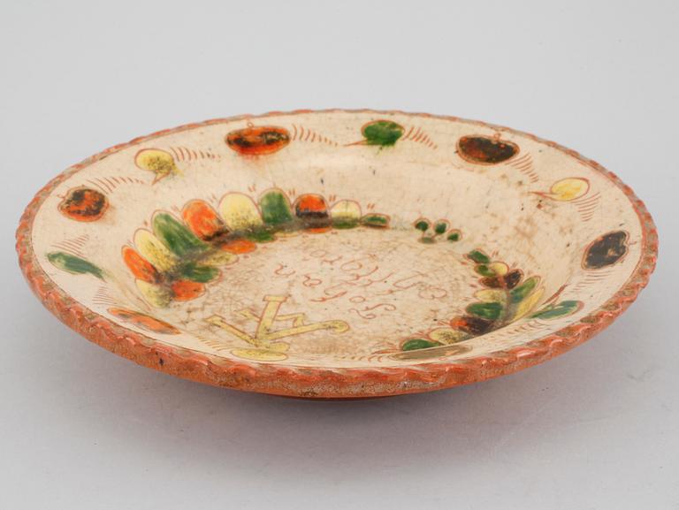 An Swedish ceramic plate, dated 1755.