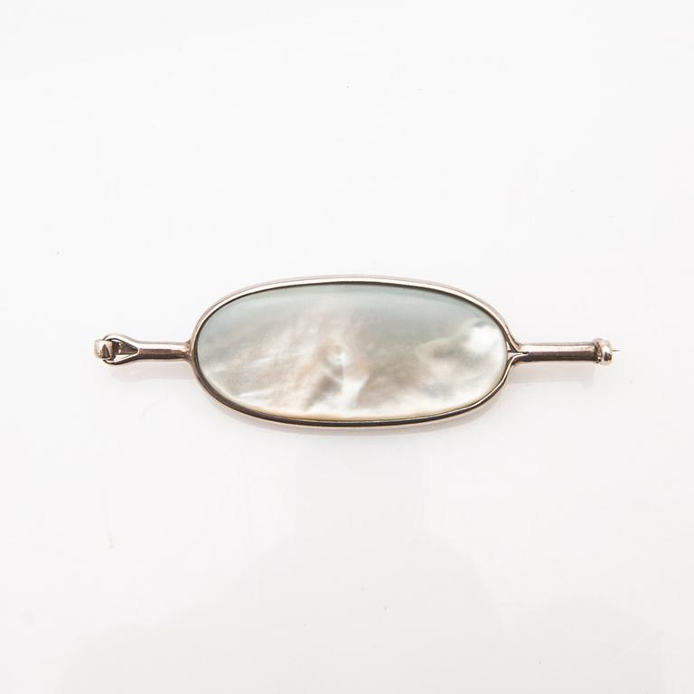 Vivianna Torun Bülow-Hübe, brooch, silver with mother-of-pearl and obsidian.