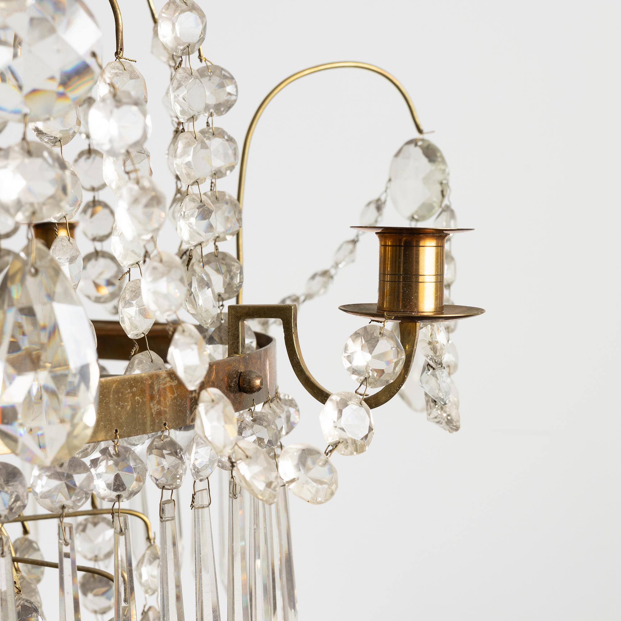 A four-light Gustavian-style chandelier, circa 1900.