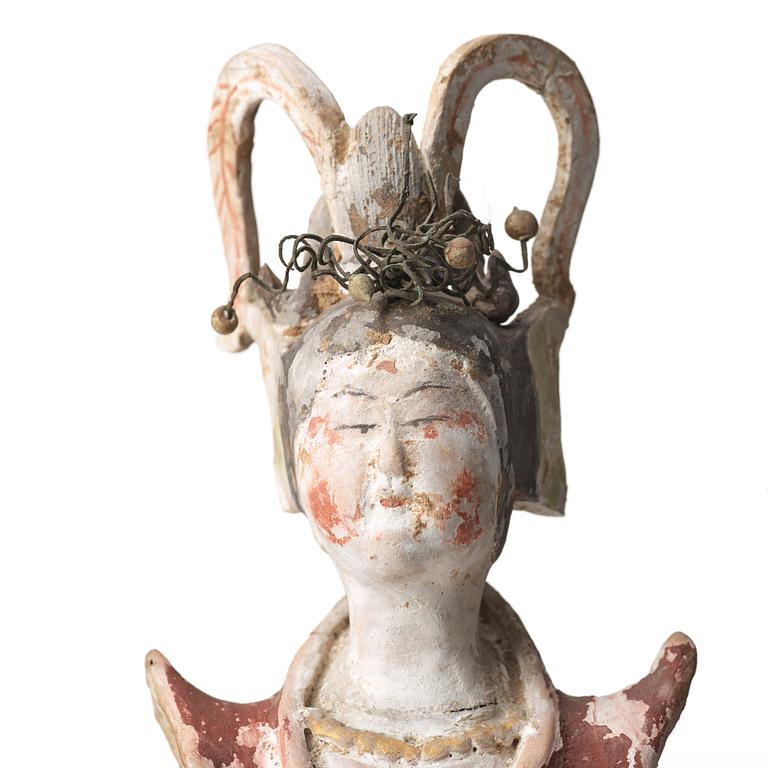 A elegant pottery figure of a court lady, Tang dynasty (618-907).